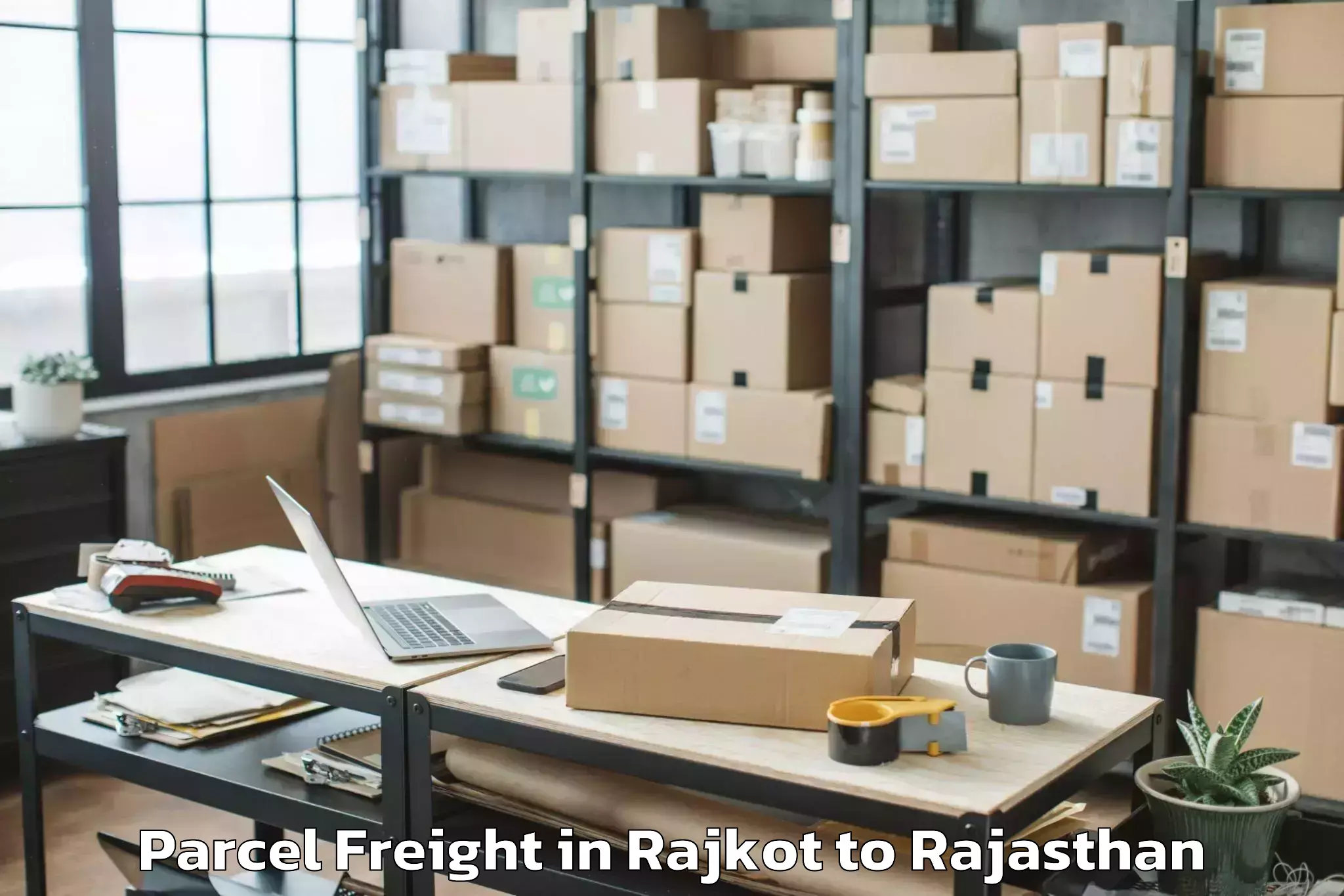 Leading Rajkot to Malpura Parcel Freight Provider